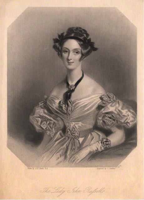 Black and white portrait of a lady wearing a pale silk dress.